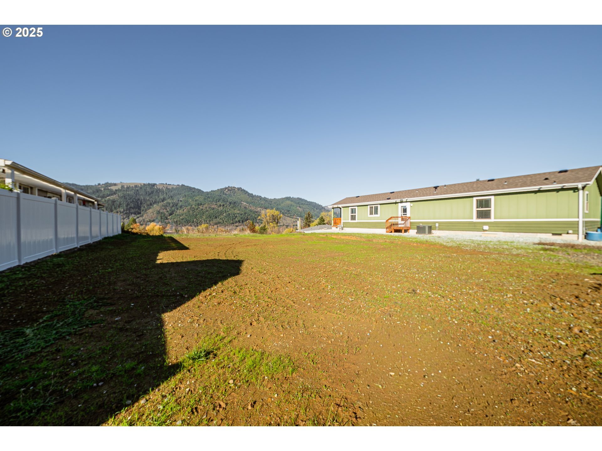 411 Clark Street Myrtle Creek, OR 97457 - Photo 6 of 14 a view of an ocean and beach