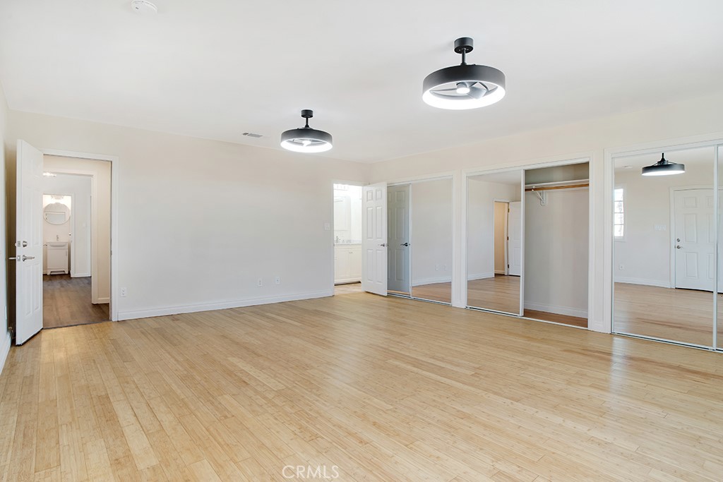 7635 Fallbrook Avenue West Hills, CA 91304 - Photo 9 of 26 a view of a livingroom with a chandelier fan