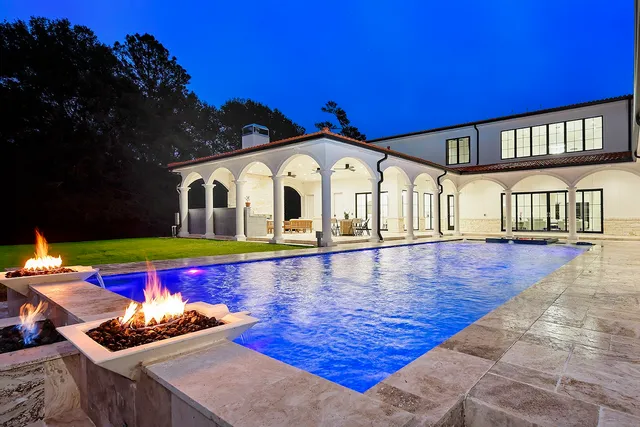 a view of living room and chandelier