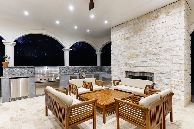 an aerial view of a house having yard