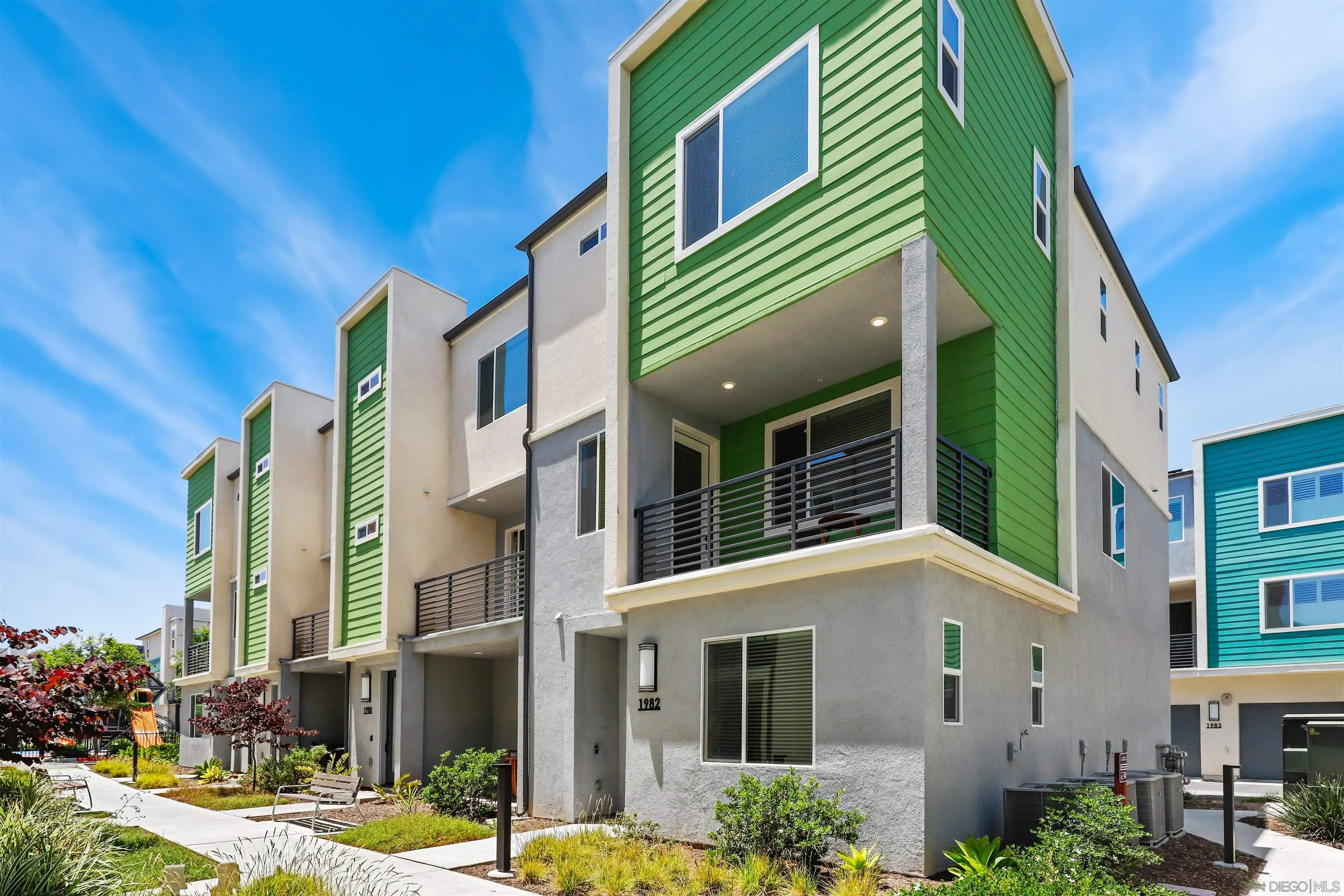 1982 Affinity Lane Chula Vista, CA 91915 - Photo 1 of 34 a front view of a multi story building with yard