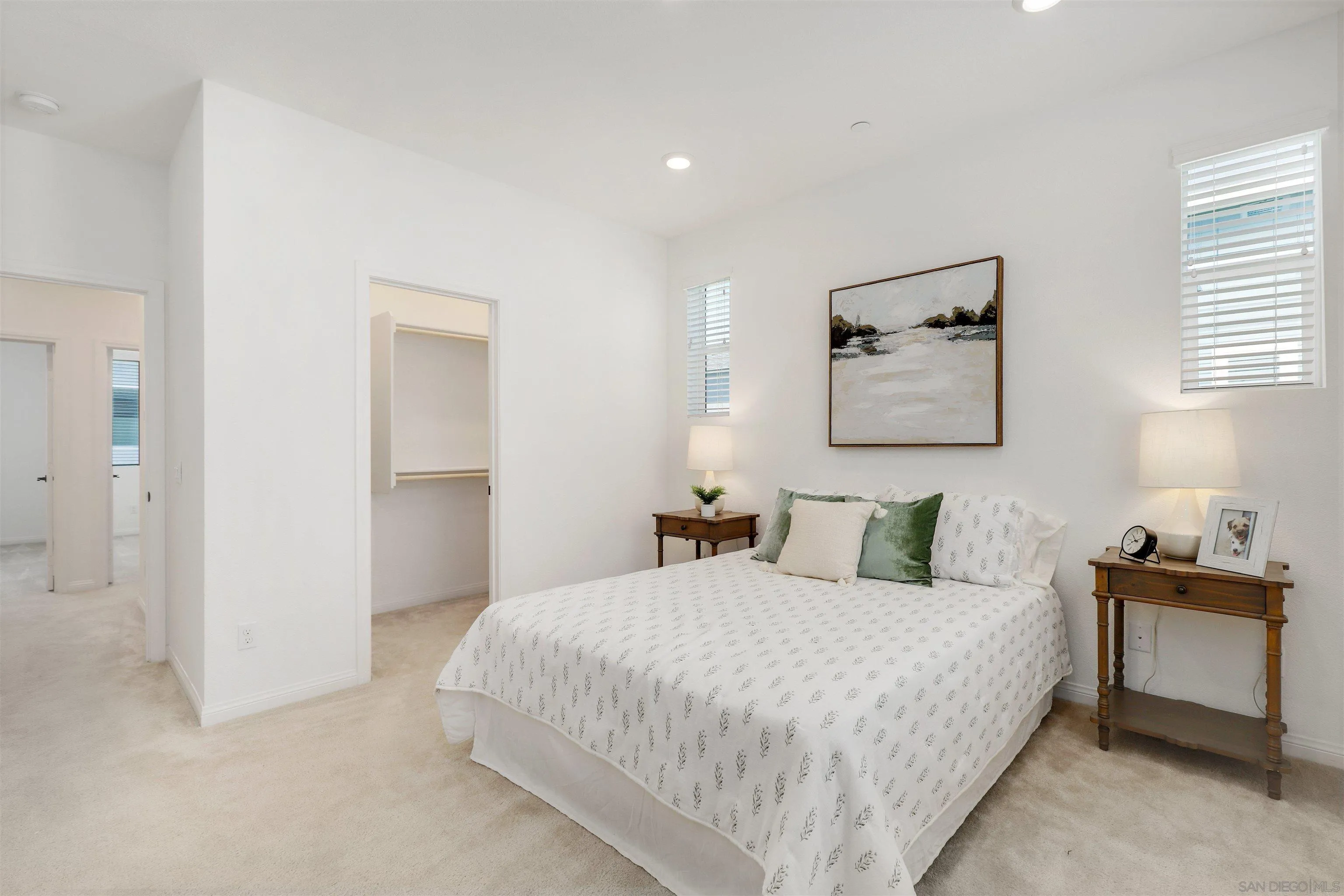 1982 Affinity Lane Chula Vista, CA 91915 - Photo 14 of 34 a bedroom with a bed and a painting