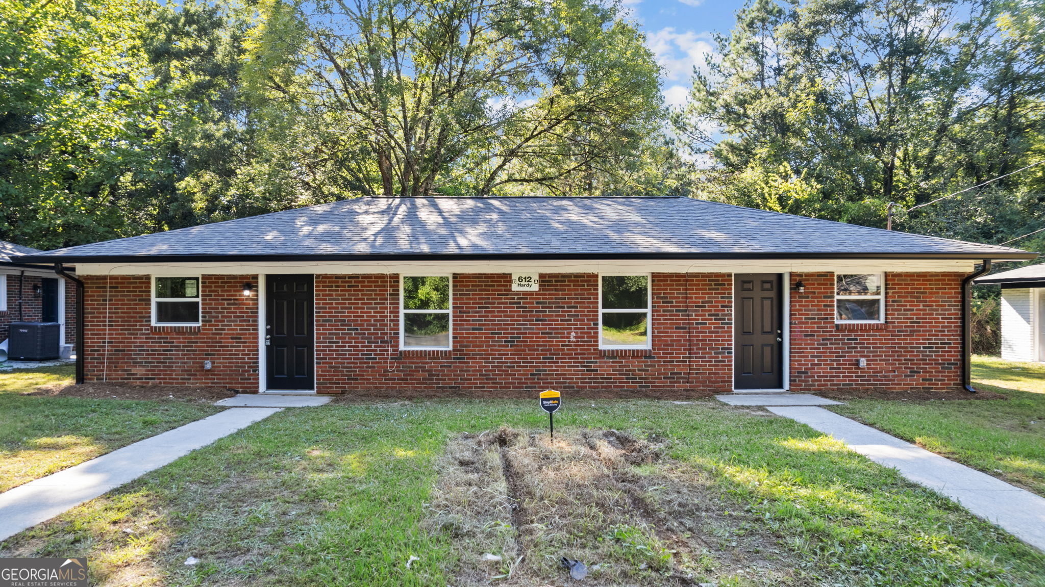 612 Hardy Avenue Southwest, Unit AB Rome, GA 30161 - Photo 1 of 1 a view of front of a house with a yard