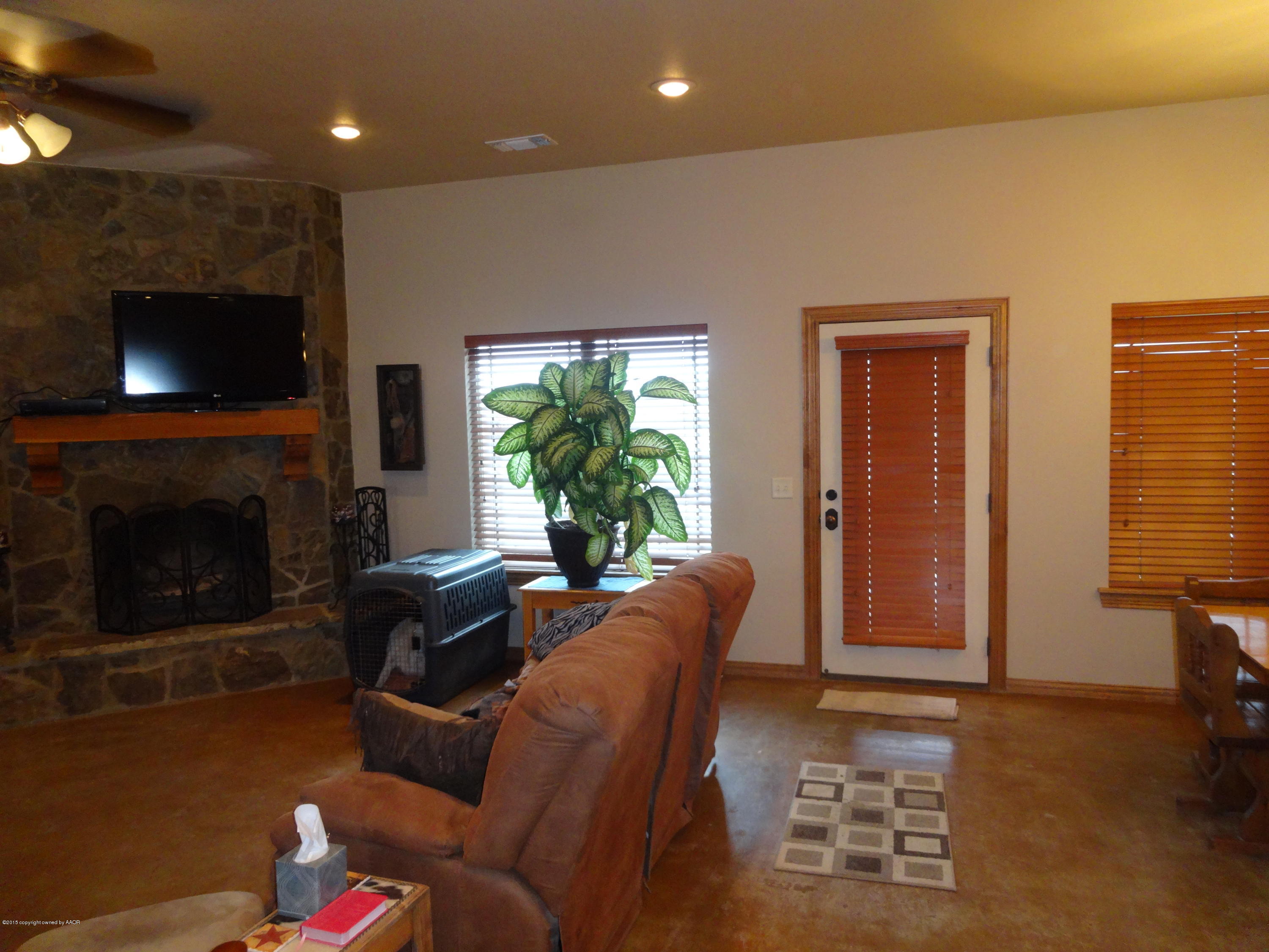 25601 Pondaseta Road Canyon, TX 79015 - Photo 18 of 49 Living area, back door to porch