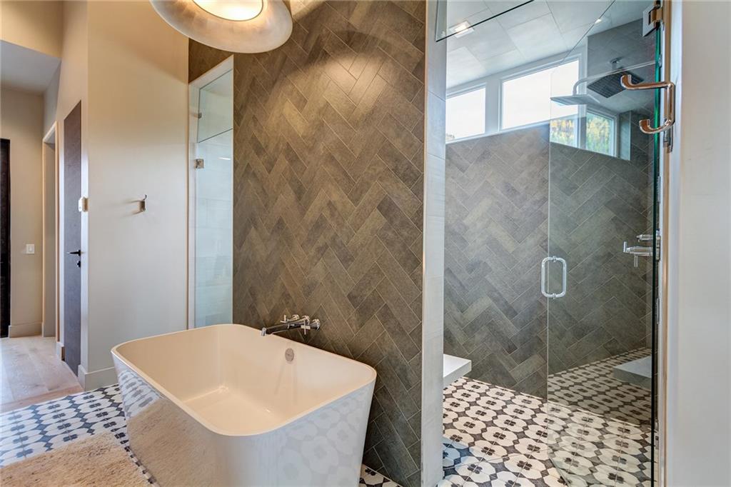 2989 Tiger Road Breckenridge, CO 80424 - Photo 13 of 30 a bathroom with a bathtub and shower