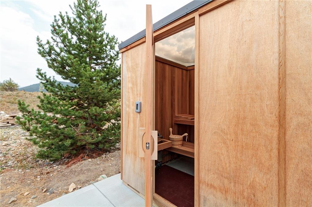 2989 Tiger Road Breckenridge, CO 80424 - Photo 21 of 30 a view of a bathroom with a sink and a mirror