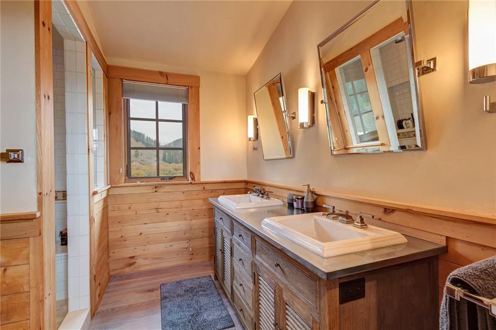 2989 Tiger Road Breckenridge, CO 80424 - Photo 28 of 30 a bathroom with a sink and a mirror