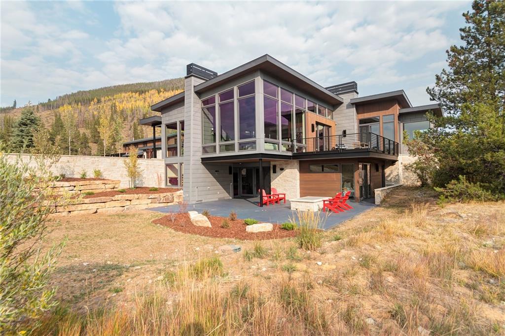 2989 Tiger Road Breckenridge, CO 80424 - Photo 30 of 30 a view of a house with wooden deck and a lake view