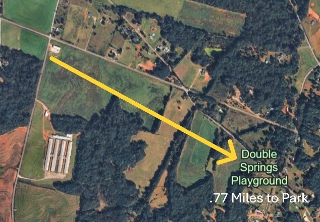 119 Dobbins Road Townville, SC 29689 - Photo 21 of 21 An aerial view showcases expansive rural landscapes, hinting at community proximity.