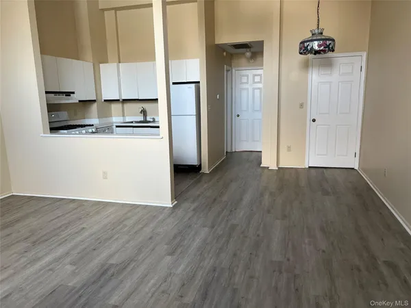 a view of kitchen with wooden floor