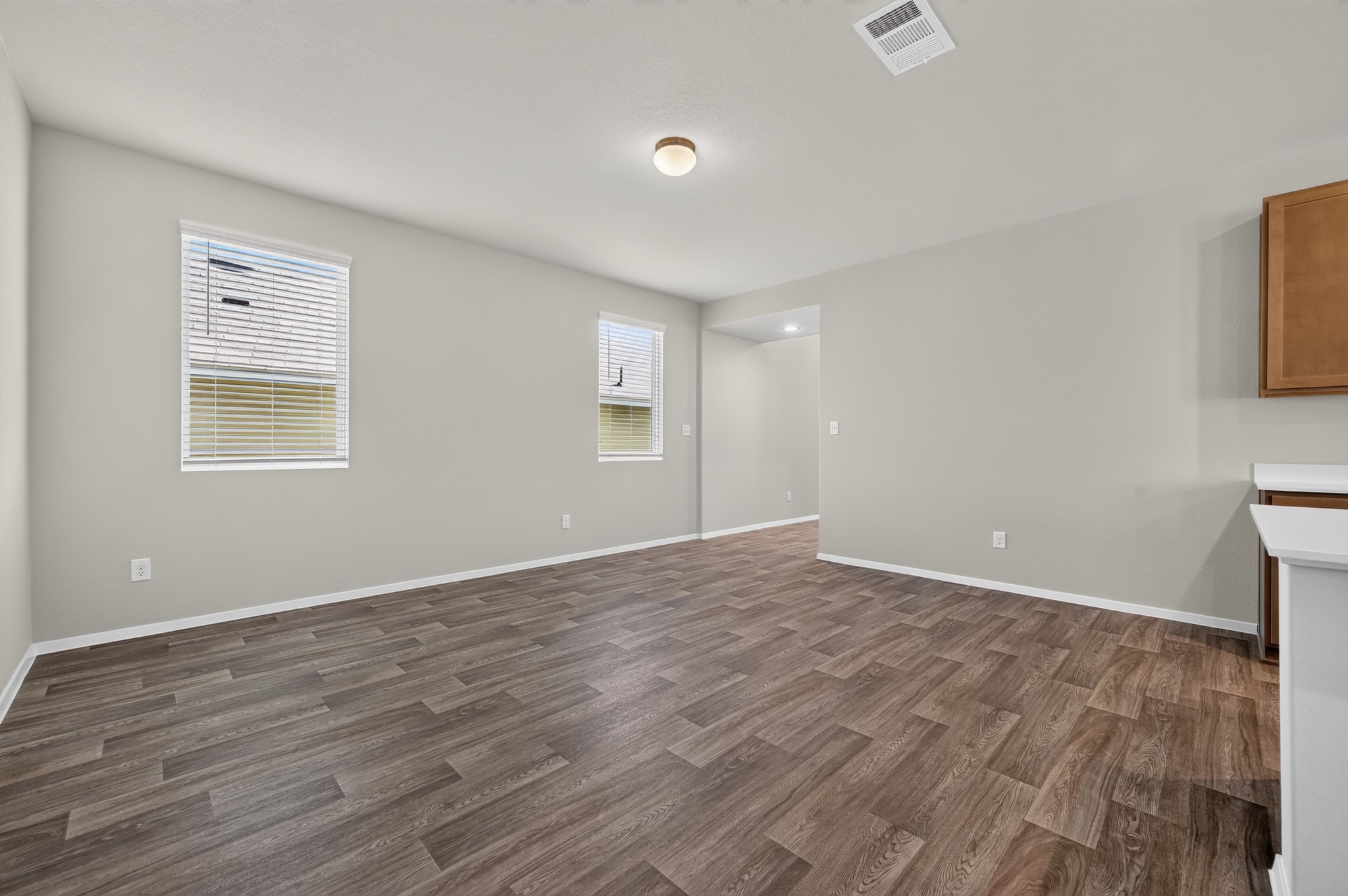 2704 Towy Road Manor, TX 78653 - Photo 29 of 36 Clean lines and durable vinyl flooring define this versatile main living area.