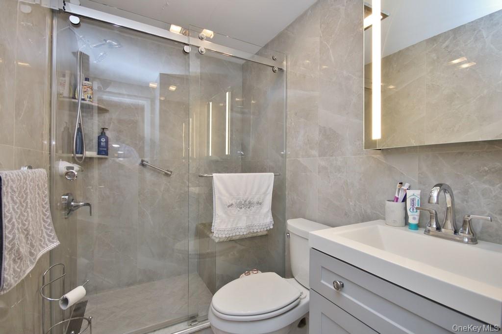 30 Granite Springs Road Granite Springs, NY 10527 - Photo 26 of 37 a bathroom with a sink a toilet and shower
