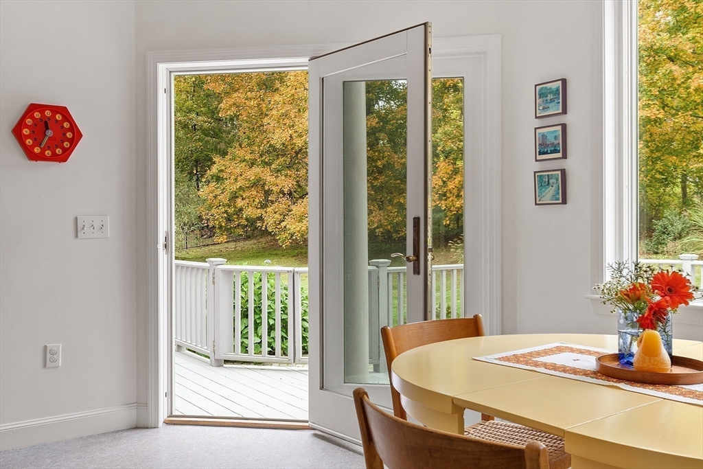 4 Hazelwood Circle Andover, MA 01810 - Photo 18 of 42 a dining room with a table and chairs