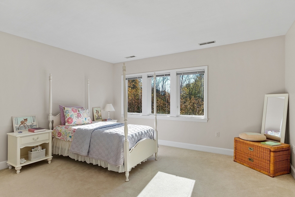 4 Hazelwood Circle Andover, MA 01810 - Photo 33 of 42 a bedroom with a bed and a window