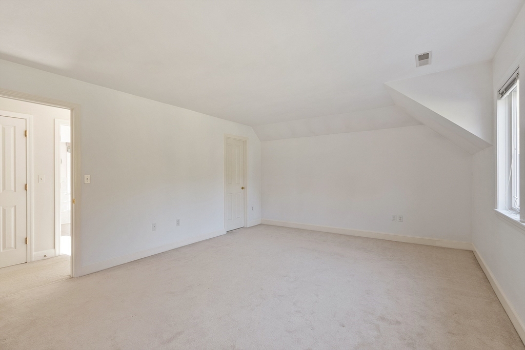 4 Hazelwood Circle Andover, MA 01810 - Photo 34 of 42 an empty room with a window