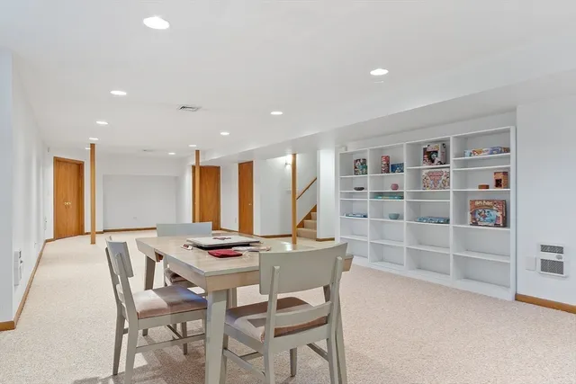 a workspace with furniture and a window