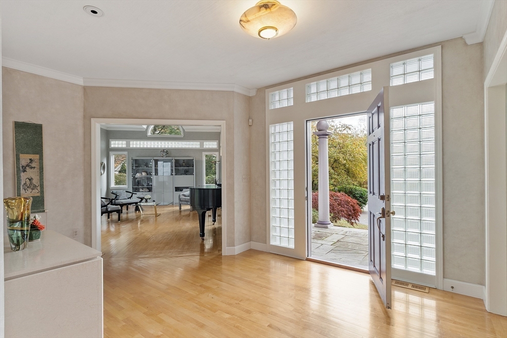 4 Hazelwood Circle Andover, MA 01810 - Photo 8 of 42 a view of a livingroom with furniture and floor to ceiling window