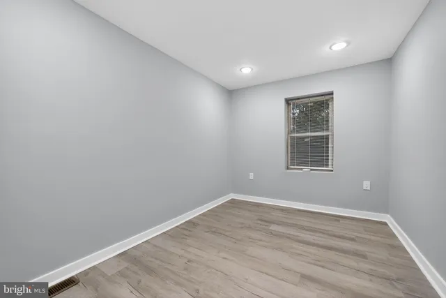 a view of empty room with windows