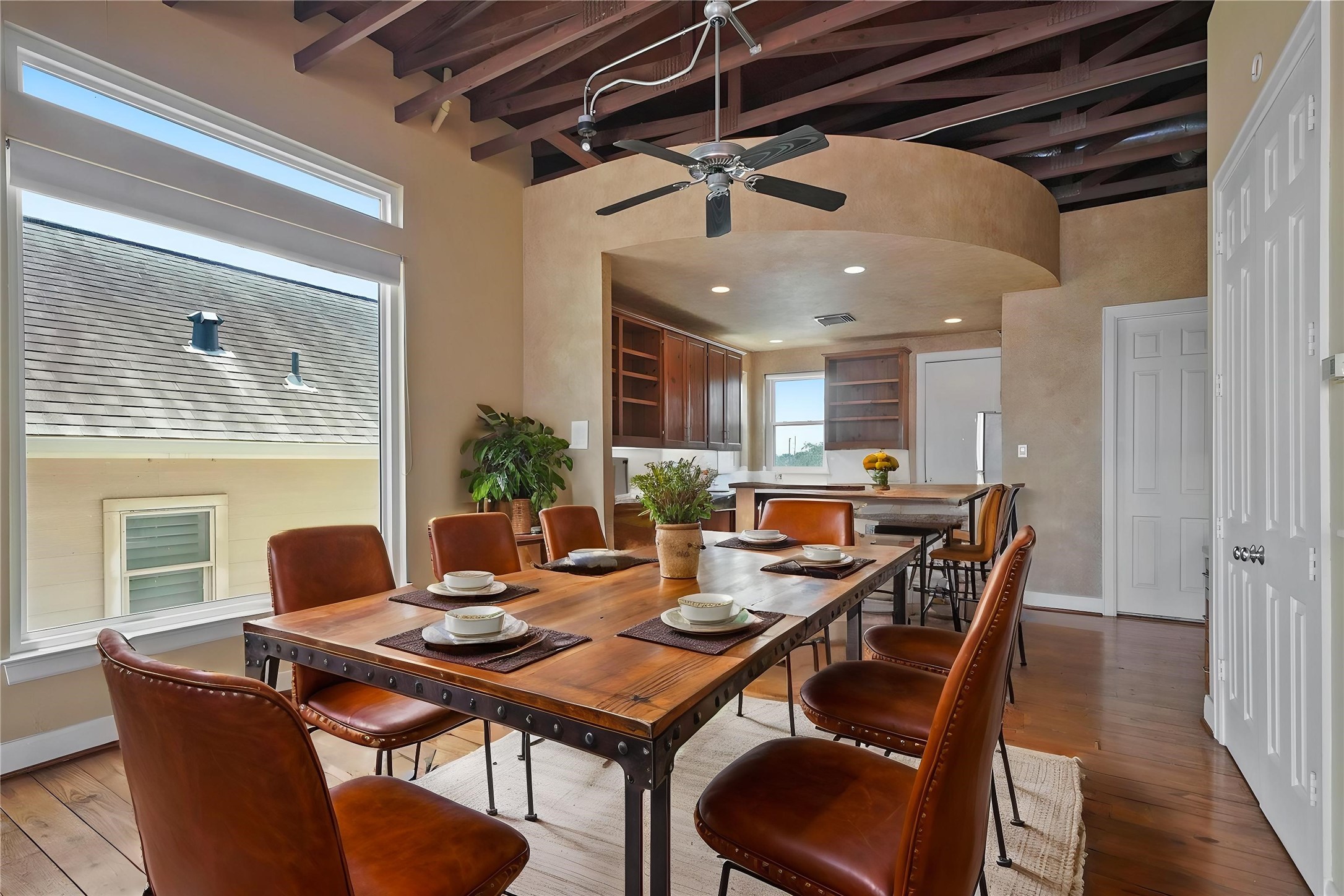 1514 Stanford Street Houston, TX 77019 - Photo 11 of 34 a view of a dining room with furniture and wooden floor
