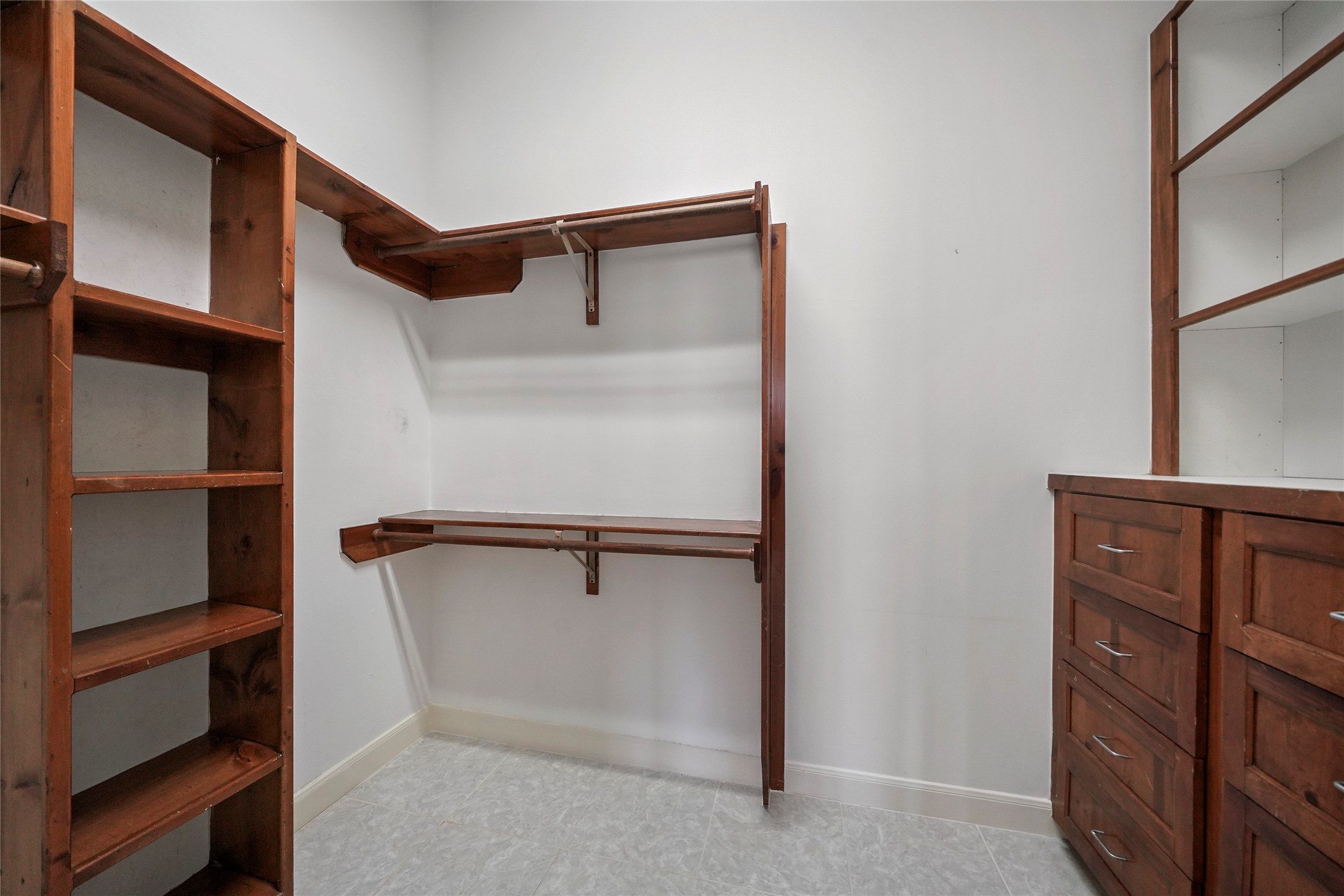 1514 Stanford Street Houston, TX 77019 - Photo 27 of 34 a view of an empty walk in closet