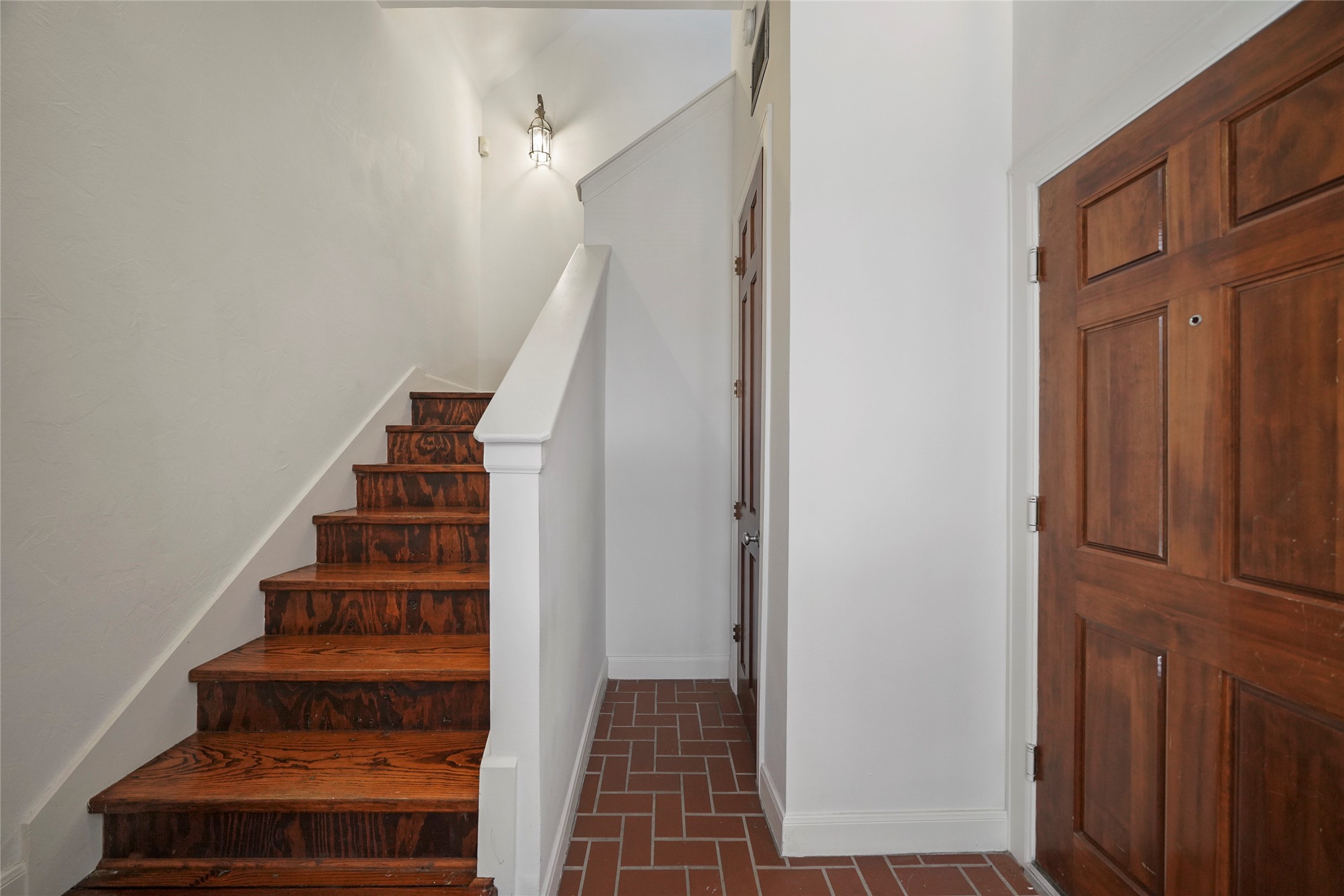 1514 Stanford Street Houston, TX 77019 - Photo 3 of 34 a view of entryway with wooden floor