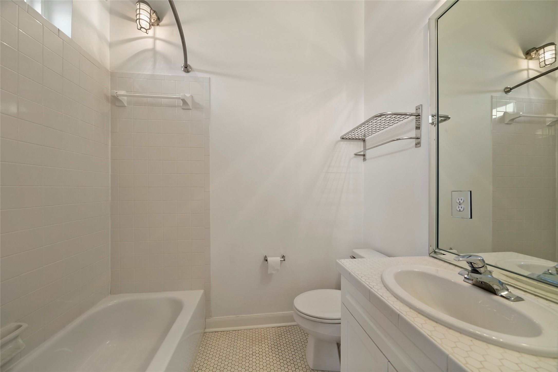 1514 Stanford Street Houston, TX 77019 - Photo 31 of 34 a bathroom with a sink toilet and shower