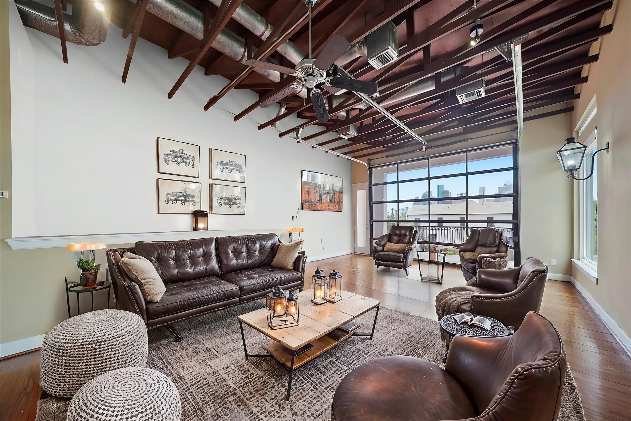 1514 Stanford Street Houston, TX 77019 - Photo 6 of 34 a living room with furniture a couch and a chandelier