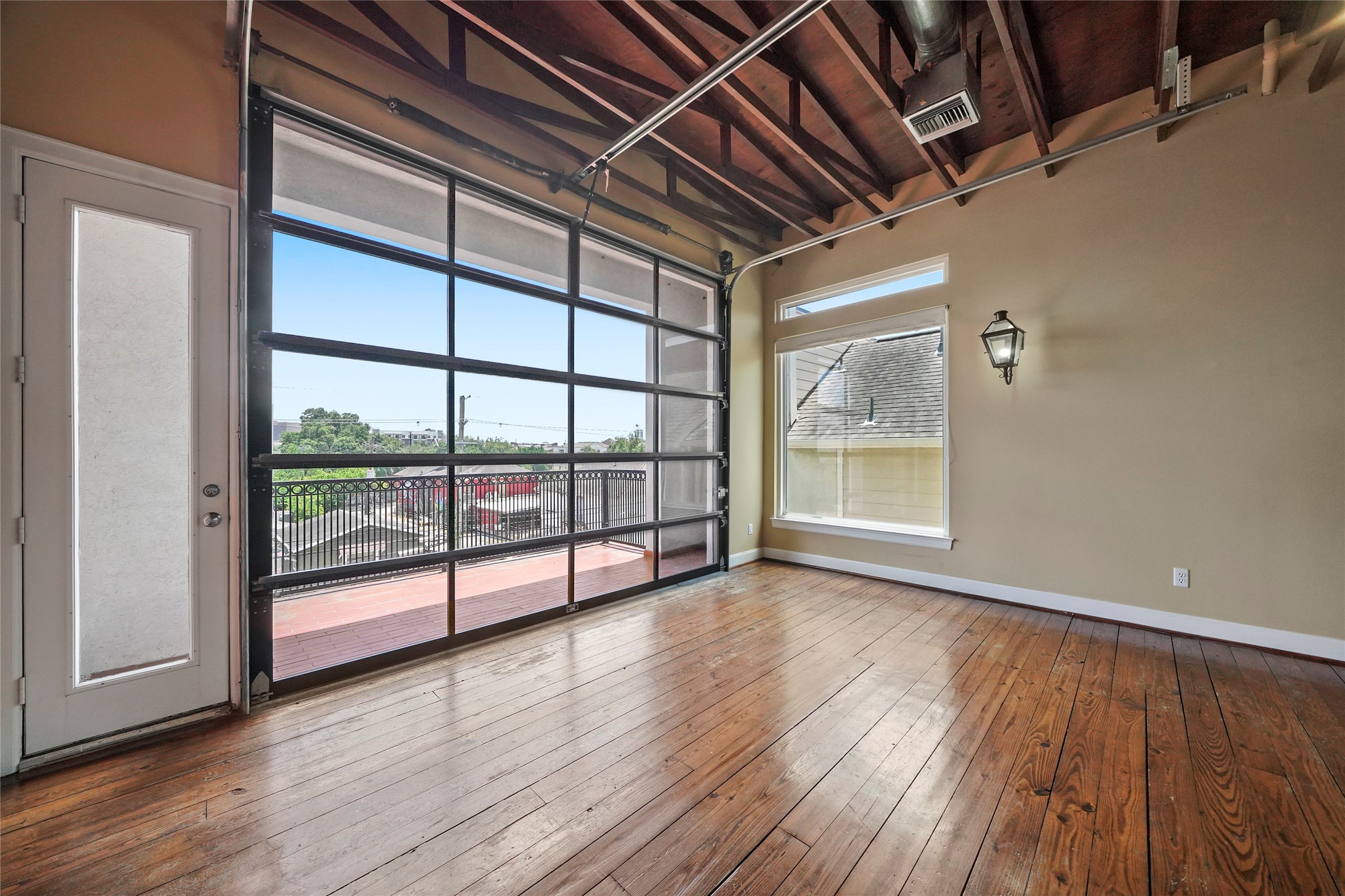 1514 Stanford Street Houston, TX 77019 - Photo 8 of 34 a view of empty room with wooden floor and fan
