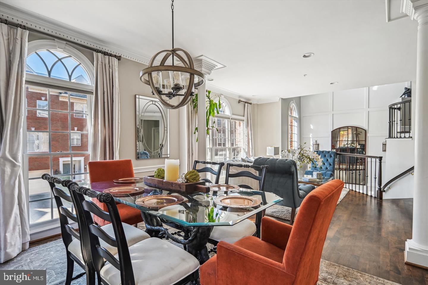 20366 Fallsway Terrace Sterling, VA 20165 - Photo 15 of 45 a view of a dining room with furniture window and wooden floor