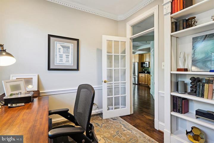 20366 Fallsway Terrace Sterling, VA 20165 - Photo 19 of 45 a view of a workspace with furniture and a window