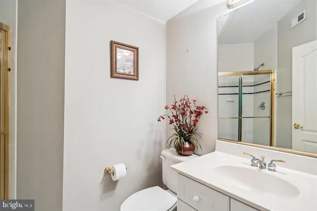 a bedroom with a bed and a closet