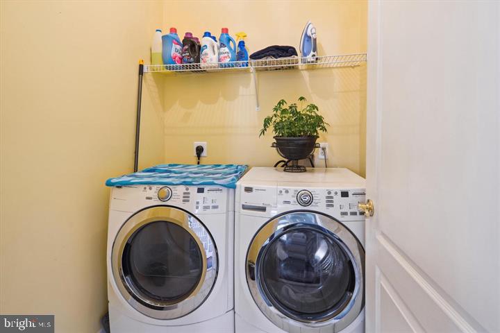 20366 Fallsway Terrace Sterling, VA 20165 - Photo 32 of 45 a utility room with dryer and washer