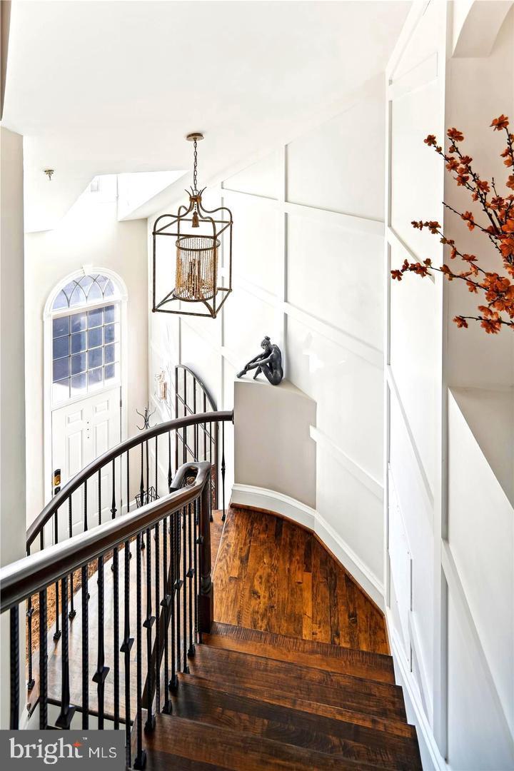 20366 Fallsway Terrace Sterling, VA 20165 - Photo 6 of 45 a view of entryway and hall with wooden floor