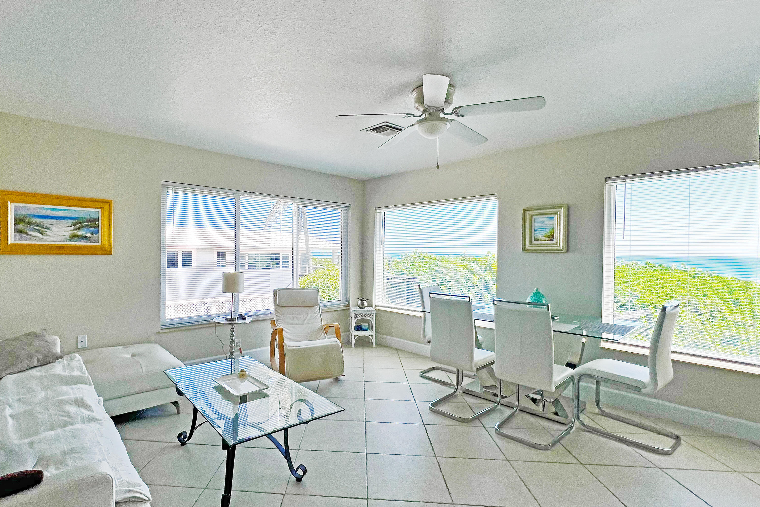 3541 Northeast Ocean Boulevard, Unit 4 Jensen Beach, FL 34957 - Photo 7 of 34 Waterfront Living Room 1