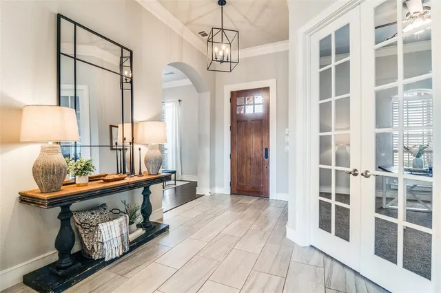 a view of a hallway with windows