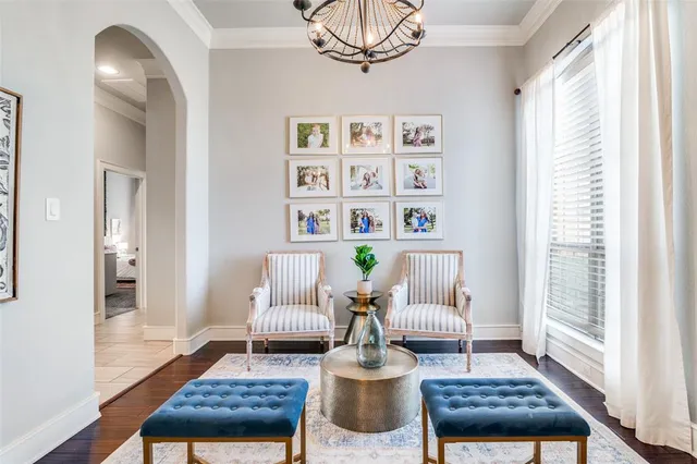 a living room with furniture and a rug