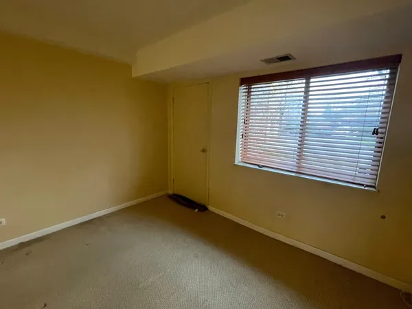 $89,900 | 3235 South Manor Drive, Unit 104, Lansing, IL 60438