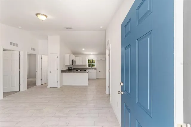 a view of kitchen with wooden floor