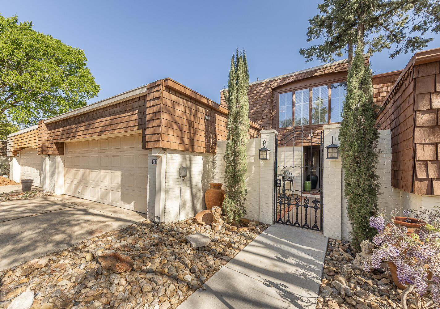 2302 Slide Road, Unit 25 Lubbock, TX 79407 - Photo 1 of 40 a front view of a house