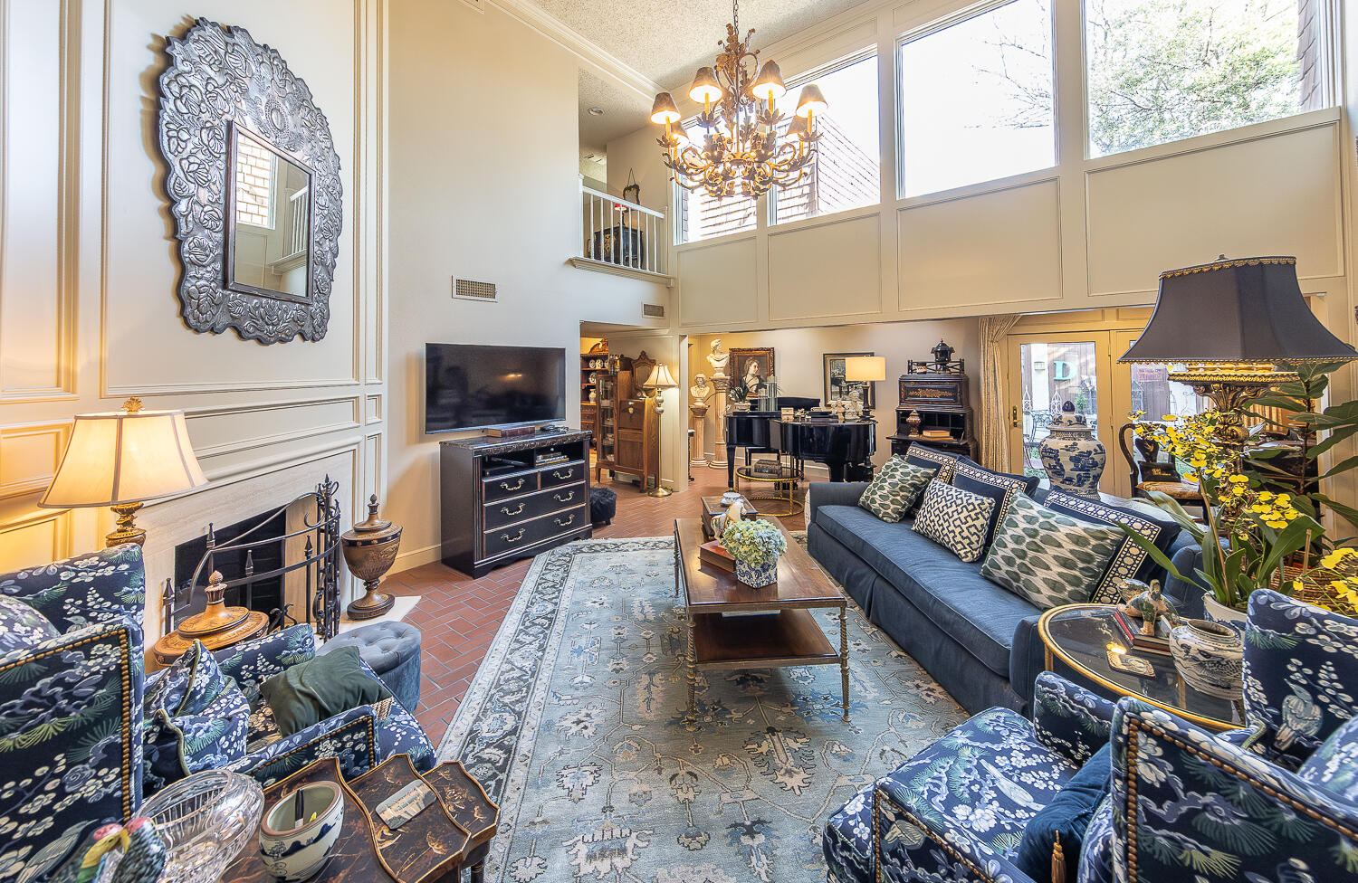 2302 Slide Road, Unit 25 Lubbock, TX 79407 - Photo 20 of 40 a living room with furniture fireplace and flat screen tv