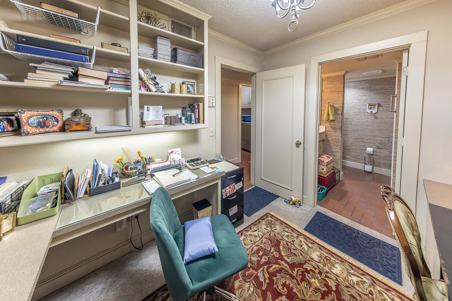 2302 Slide Road, Unit 25 Lubbock, TX 79407 - Photo 23 of 40 a living room with hard wood flooring and a couch