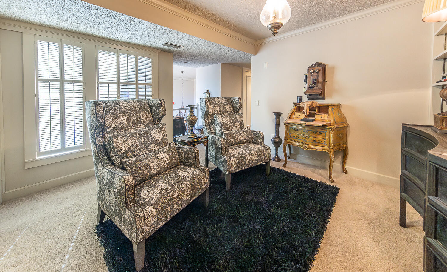 2302 Slide Road, Unit 25 Lubbock, TX 79407 - Photo 35 of 40 a living room with furniture and a window