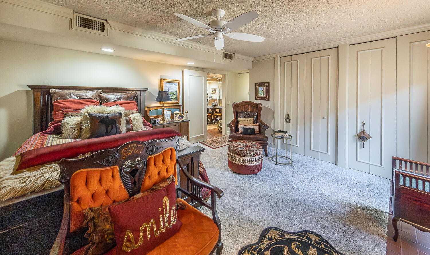 2302 Slide Road, Unit 25 Lubbock, TX 79407 - Photo 5 of 40 a view of a livingroom with furniture and a ceiling fan