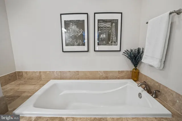 a bathroom with bathtub