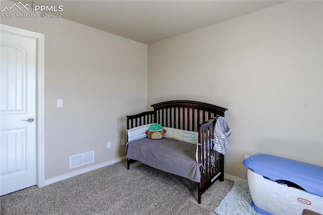 6311 Pilgrimage Road Colorado Springs, CO 80925 - Photo 19 of 24 3rd upper bedroom