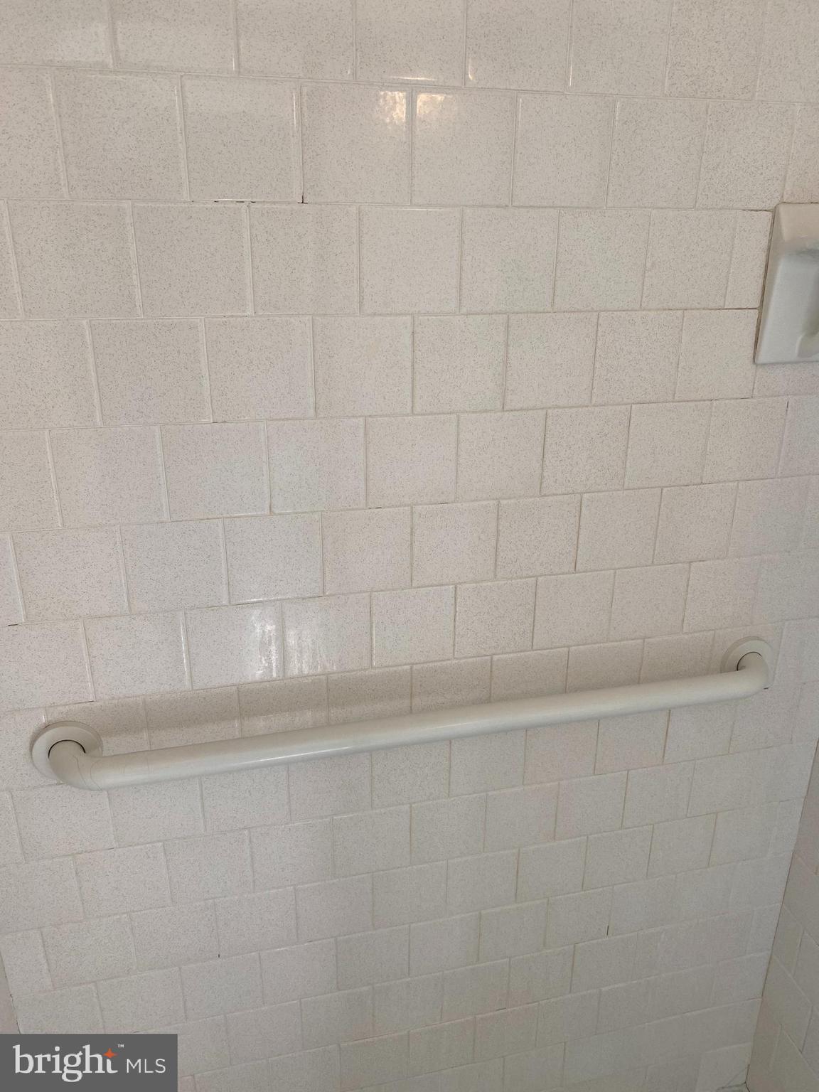 706 Crosby Road Baltimore, MD 21228 - Photo 45 of 89 White tiled shower