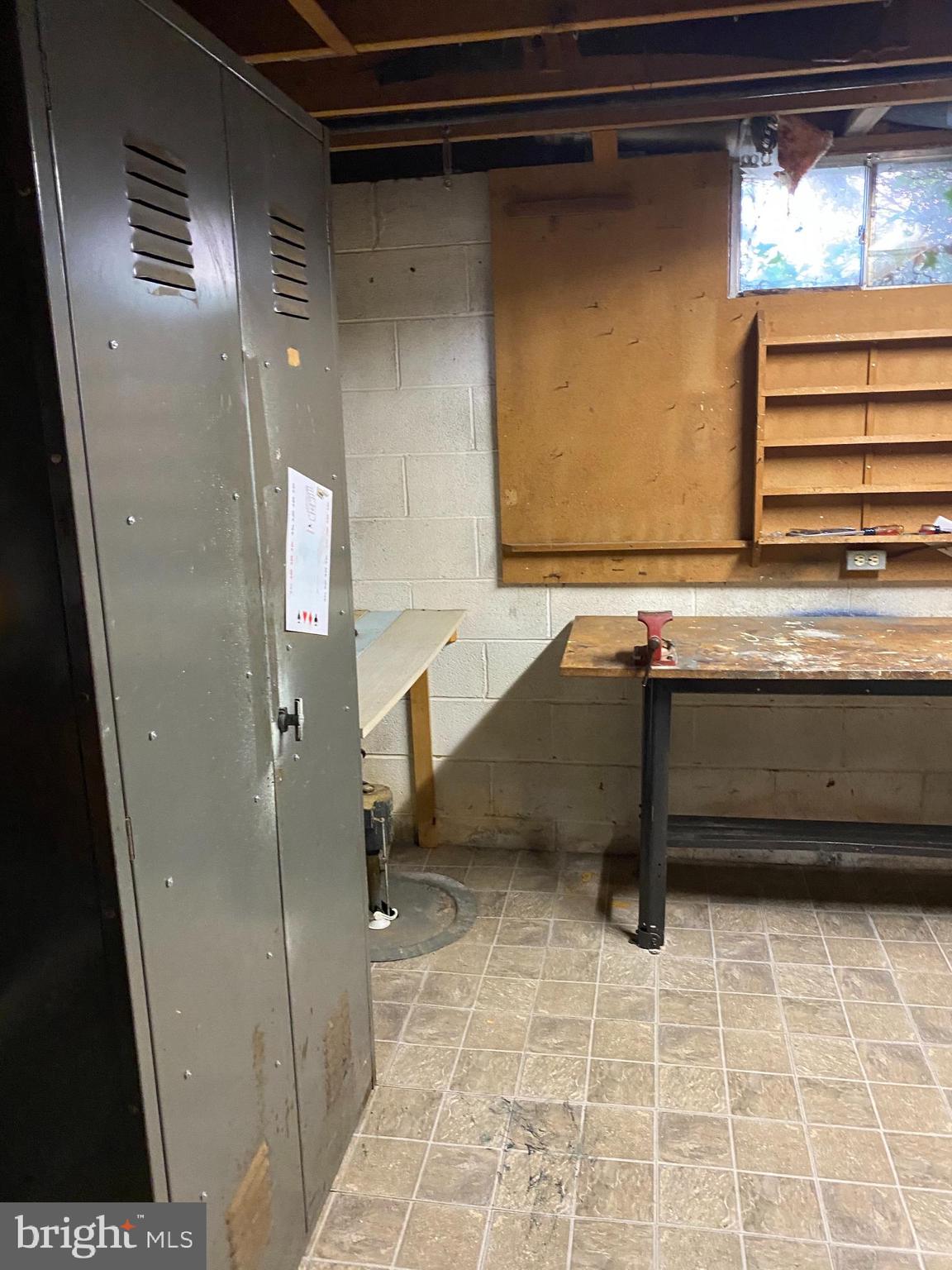 706 Crosby Road Baltimore, MD 21228 - Photo 63 of 89 workbench, room to repair or garden