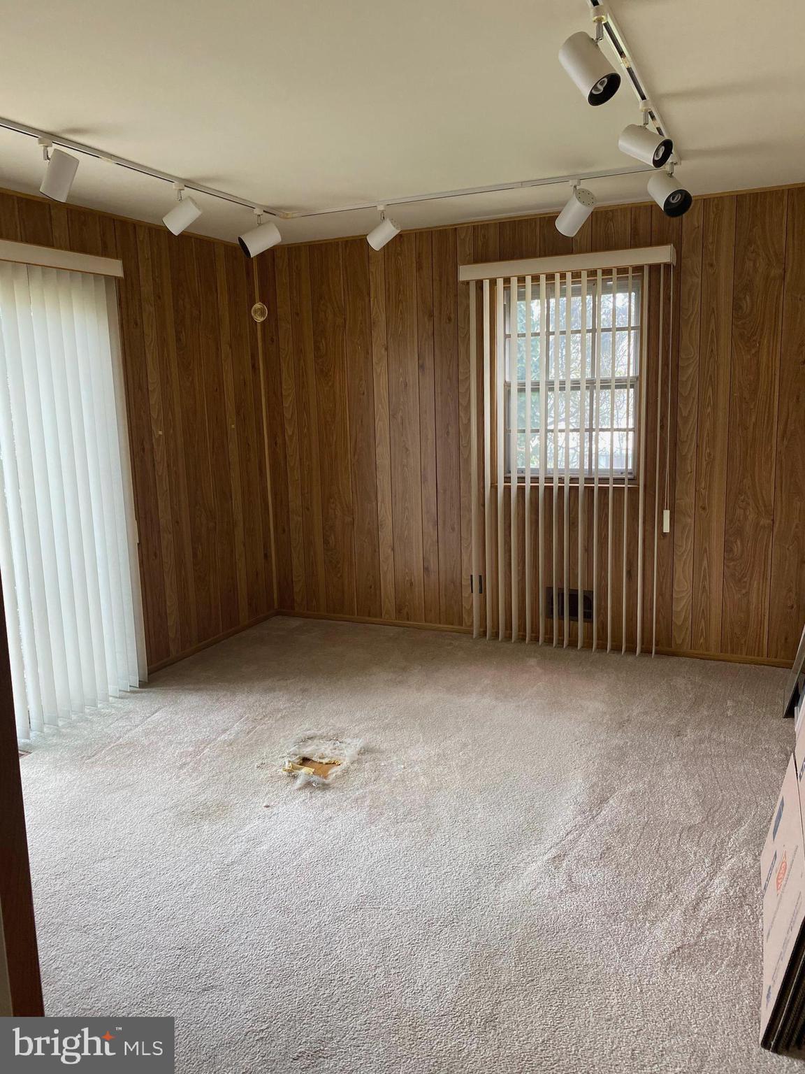 706 Crosby Road Baltimore, MD 21228 - Photo 8 of 89 5th bedroom downstairs, used as den -Wood floors t