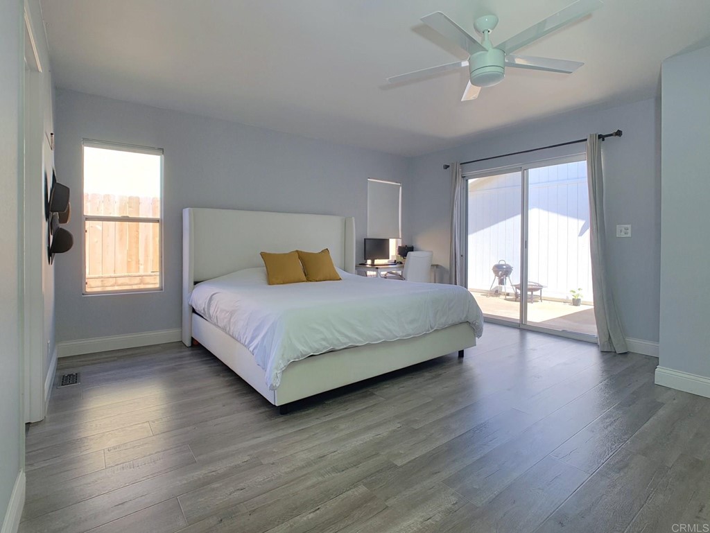 15935 Spring Oaks Road, Unit 63 El Cajon, CA 92021 - Photo 19 of 38 a bedroom with a large bed and a window