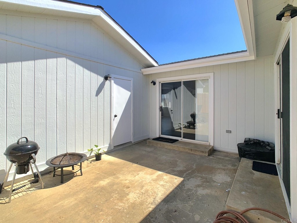 15935 Spring Oaks Road, Unit 63 El Cajon, CA 92021 - Photo 33 of 38 a view of a livingroom with furniture and staircase